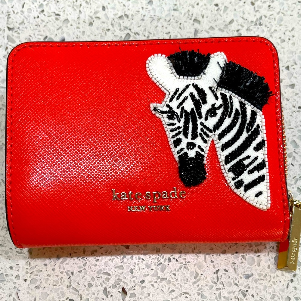 Kate Spade small orange leather zebra wallet